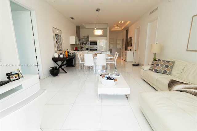 150 Sunny Isles Blvd Unit 1-Th403, Sunny Isles Beach, FL 33160 - living room with light tile patterned floors