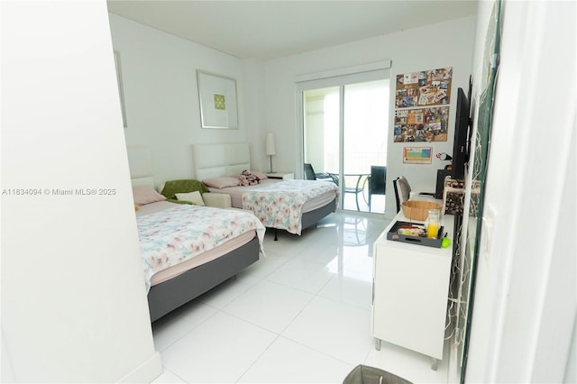 150 Sunny Isles Blvd Unit 1-Th403, Sunny Isles Beach, FL 33160 - bedroom featuring light tile patterned flooring