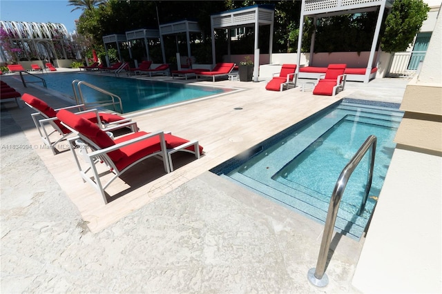 150 Sunny Isles Blvd Unit 1-Th403, Sunny Isles Beach, FL 33160 - community pool featuring a patio