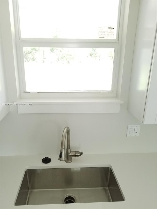17186 N 84th Ct, Loxahatchee, FL 33470 - kitchen view of a sink and light countertops