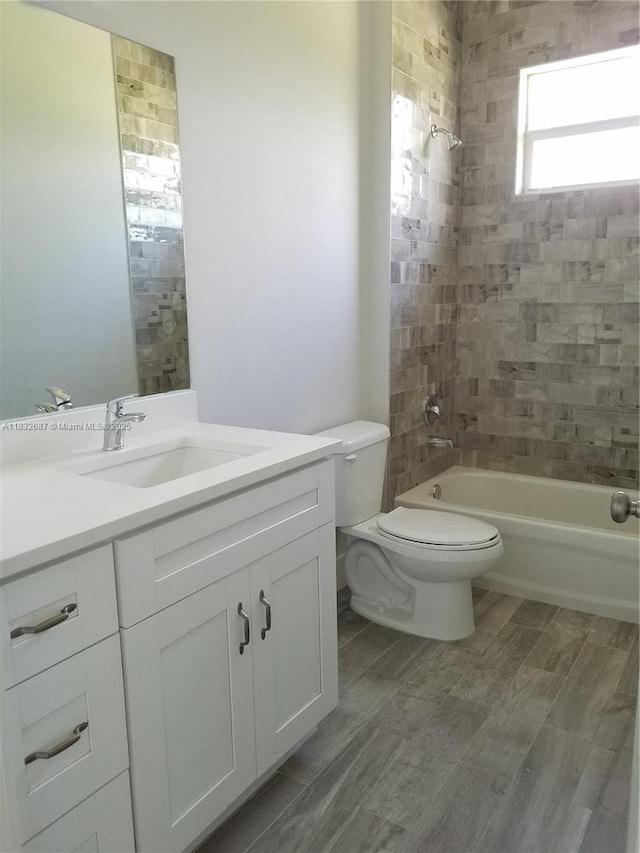 17186 N 84th Ct, Loxahatchee, FL 33470 - full bathroom with vanity, bathing tub / shower combination, and wood finished floors
