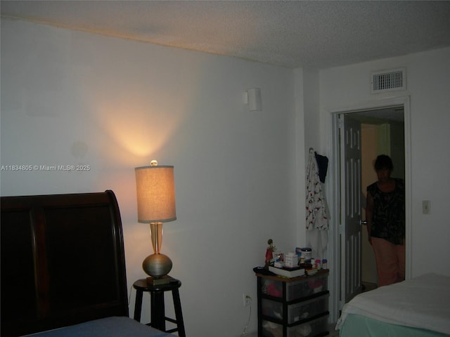 8841 W Flagler St Unit 103, Miami, FL 33174 - bedroom featuring a textured ceiling