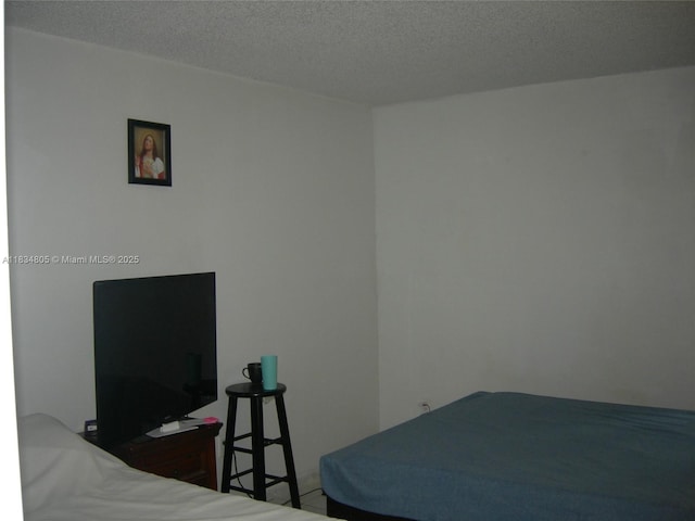 8841 W Flagler St Unit 103, Miami, FL 33174 - bedroom featuring a textured ceiling