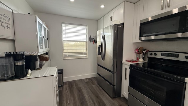 3910 Inverrary Blvd Unit 503-B, Lauderhill, FL 33319 - kitchen featuring stainless steel appliances, dark wood-type flooring, white cabinetry, light countertops, and recessed lighting