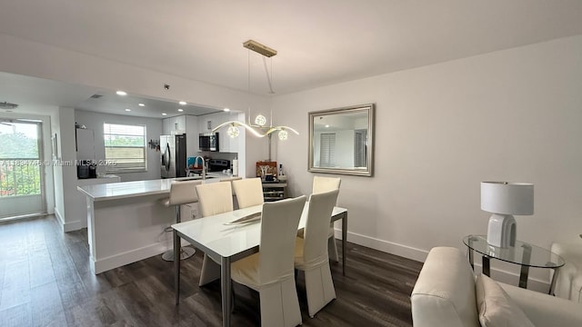 3910 Inverrary Blvd Unit 503-B, Lauderhill, FL 33319 - dining room with dark wood-style flooring and recessed lighting