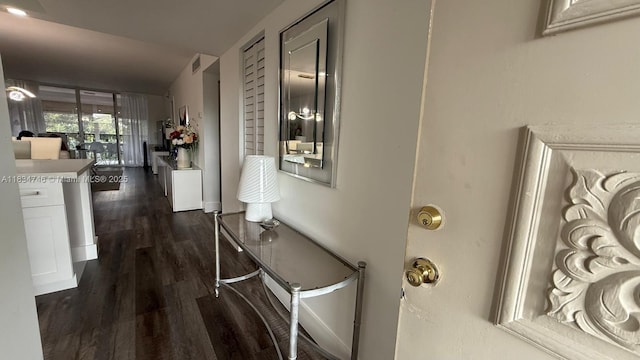 3910 Inverrary Blvd Unit 503-B, Lauderhill, FL 33319 - hallway with dark wood-style flooring