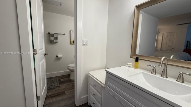 3910 Inverrary Blvd Unit 503-B, Lauderhill, FL 33319 - ensuite bathroom with wood finished floors and vanity