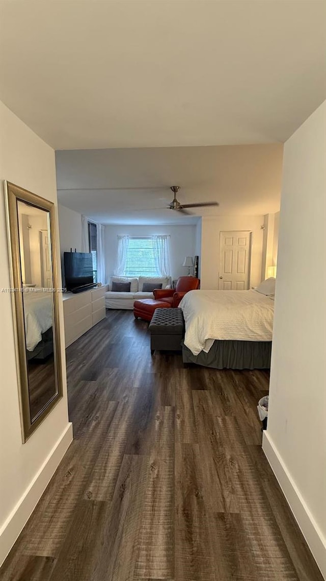 3910 Inverrary Blvd Unit 503-B, Lauderhill, FL 33319 - bedroom with ceiling fan and dark wood-style flooring