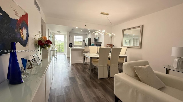 3910 Inverrary Blvd Unit 503-B, Lauderhill, FL 33319 - dining area featuring dark wood-type flooring