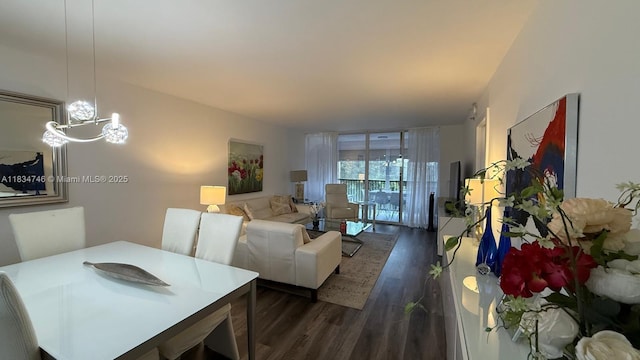 3910 Inverrary Blvd Unit 503-B, Lauderhill, FL 33319 - dining area featuring dark wood-style floors and a chandelier