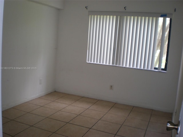 5855 Washington St Unit 92, Hollywood, FL 33023 - spare room featuring tile patterned floors