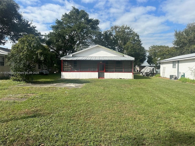 532 Bond, Clewiston, FL 33440 - view of grassy yard with a sunroom