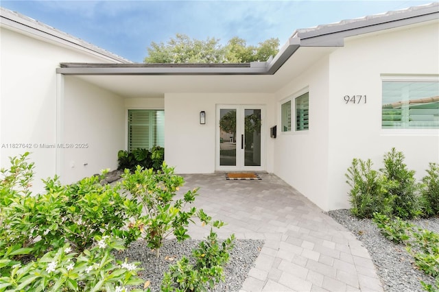 9471 SW 10th St, Miami, FL 33174 - view of exterior entry featuring stucco siding
