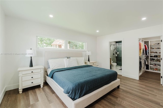 9471 SW 10th St, Miami, FL 33174 - bedroom with a walk in closet, wood finished floors, ensuite bath, recessed lighting, and a closet