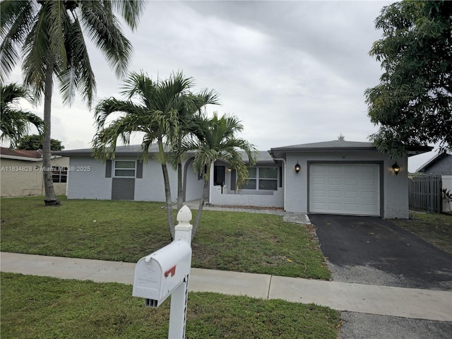 7771 NW 46th St, Lauderhill, FL 33351 - single story home featuring an attached garage, stucco siding, and driveway