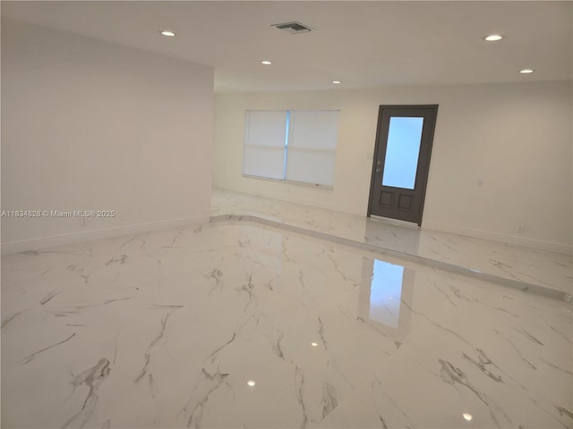 7771 NW 46th St, Lauderhill, FL 33351 - spare room featuring recessed lighting and marble finish flooring