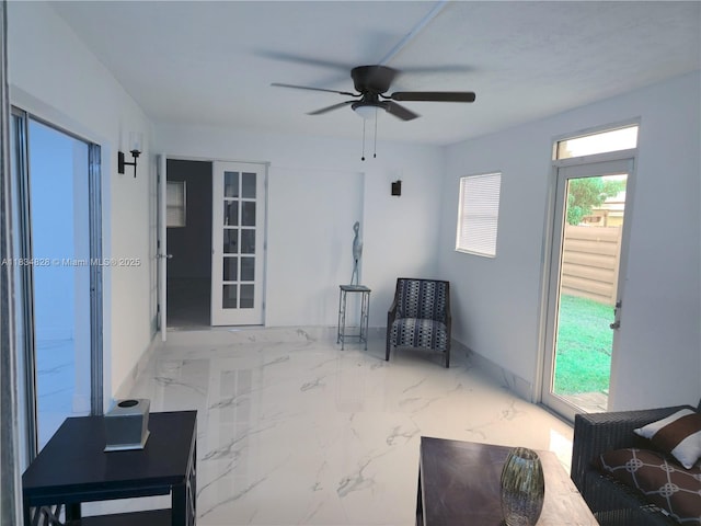 7771 NW 46th St, Lauderhill, FL 33351 - interior space with ceiling fan, marble tiled floors, and french doors