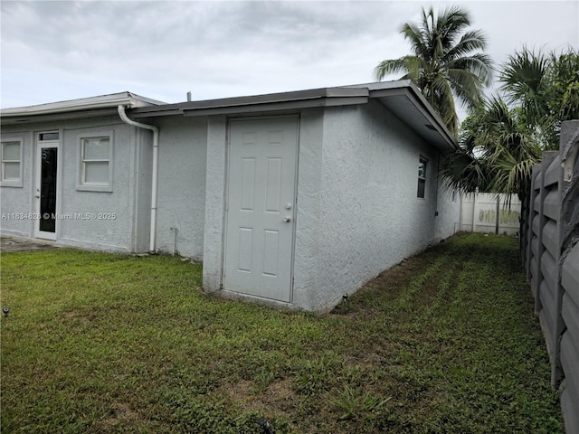 7771 NW 46th St, Lauderhill, FL 33351 - view of home's exterior with stucco siding