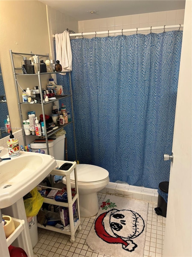 1301 SW 134th Way Unit 307B, Pembroke Pines, FL 33027 - full bath with tile patterned flooring and a shower with shower curtain