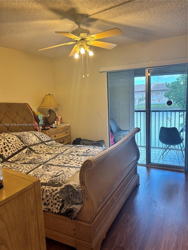 1301 SW 134th Way Unit 307B, Pembroke Pines, FL 33027 - bedroom featuring access to exterior, wood finished floors, ceiling fan, and a textured ceiling