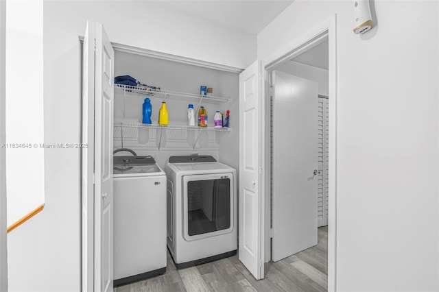11955 SW 18th Ter Unit 9, Miami, FL 33175 - laundry room featuring separate washer and dryer and light wood finished floors