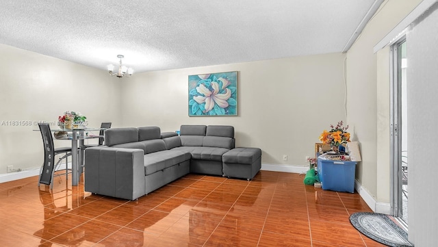 4821 NW 22nd Ct Unit 110, Lauderhill, FL 33313 - living room with a chandelier and a textured ceiling