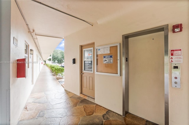 3405 NW 48th Ave Unit 610, Lauderdale Lakes, FL 33319 - corridor with elevator