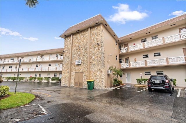 3405 NW 48th Ave Unit 610, Lauderdale Lakes, FL 33319 - view of apartment building / complex with uncovered parking