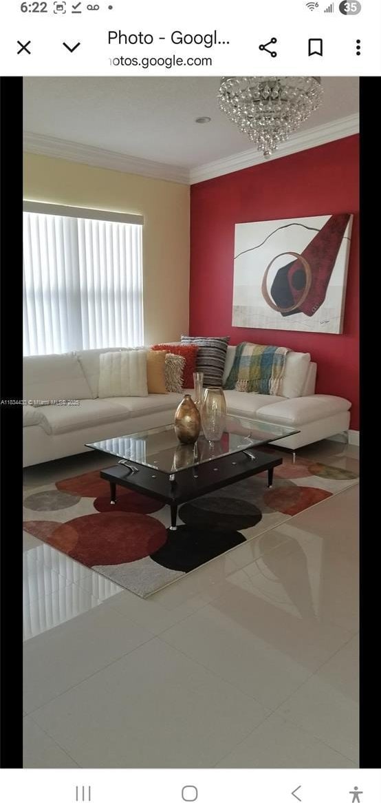 living room with ornamental molding
