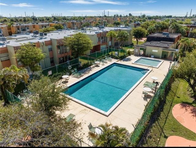 9370 W Flagler St Unit 104B, Miami, FL 33174 - community pool featuring a patio area, area for grilling, and a hot tub