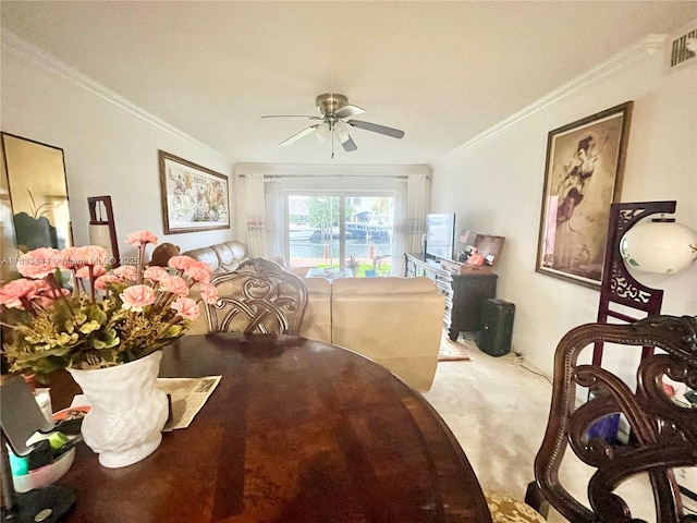 2841 NE 33rd Ct Unit 104, Fort Lauderdale, FL 33306 - dining area with ceiling fan, crown molding, and carpet
