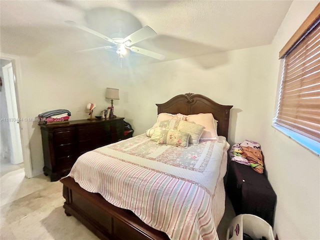 2841 NE 33rd Ct Unit 104, Fort Lauderdale, FL 33306 - bedroom with a ceiling fan and carpet floors