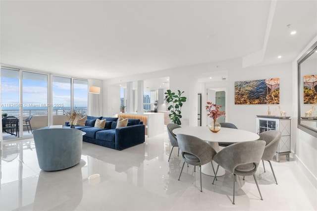 848 Brickell Key Dr Unit 2705, Miami, FL 33131 - dining area featuring bar, a wall of windows, and recessed lighting