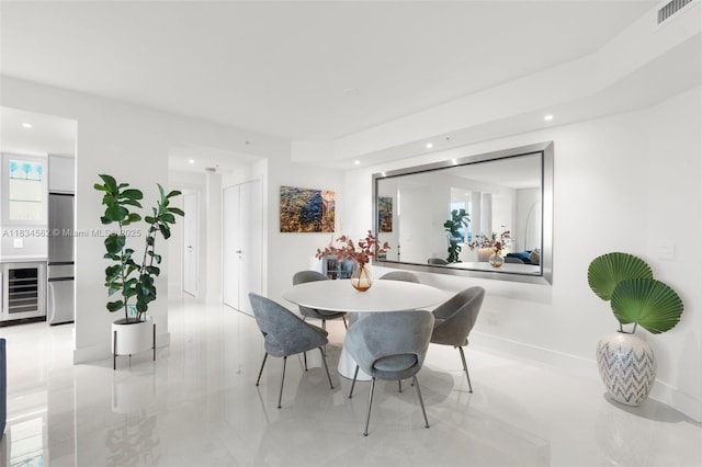 848 Brickell Key Dr Unit 2705, Miami, FL 33131 - dining space with wine cooler, recessed lighting, and light tile patterned floors