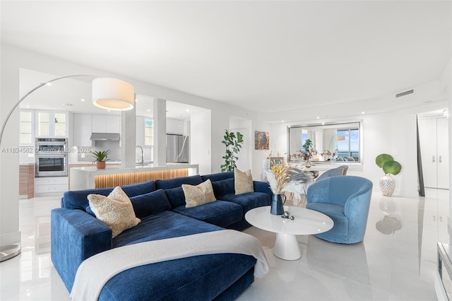 848 Brickell Key Dr Unit 2705, Miami, FL 33131 - living room featuring healthy amount of natural light and light tile patterned floors
