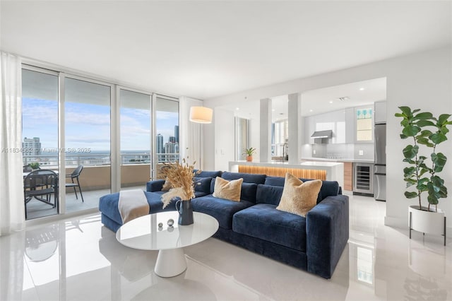 848 Brickell Key Dr Unit 2705, Miami, FL 33131 - living room with wine cooler, light tile patterned flooring, plenty of natural light, and recessed lighting