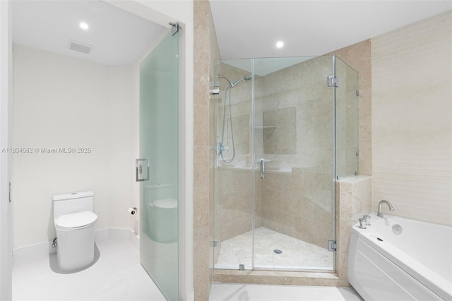 848 Brickell Key Dr Unit 2705, Miami, FL 33131 - bathroom with a bath, a shower stall, and recessed lighting