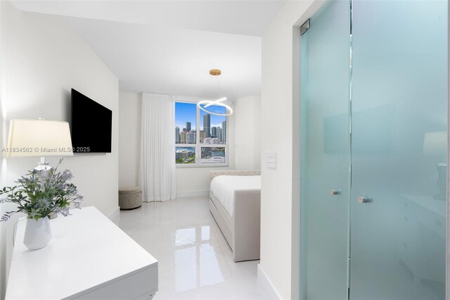 848 Brickell Key Dr Unit 2705, Miami, FL 33131 - bedroom with baseboards