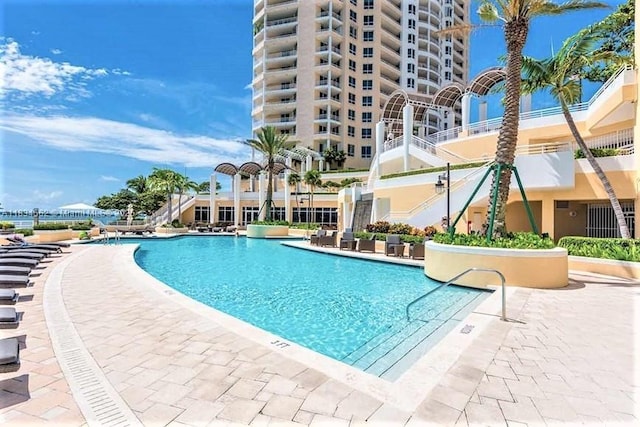 848 Brickell Key Dr Unit 2705, Miami, FL 33131 - community pool featuring a patio area