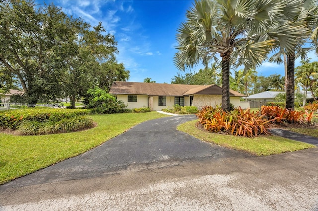 7804 SW 178th Ter, Palmetto Bay, FL 33157 - single story home with a front yard and asphalt driveway