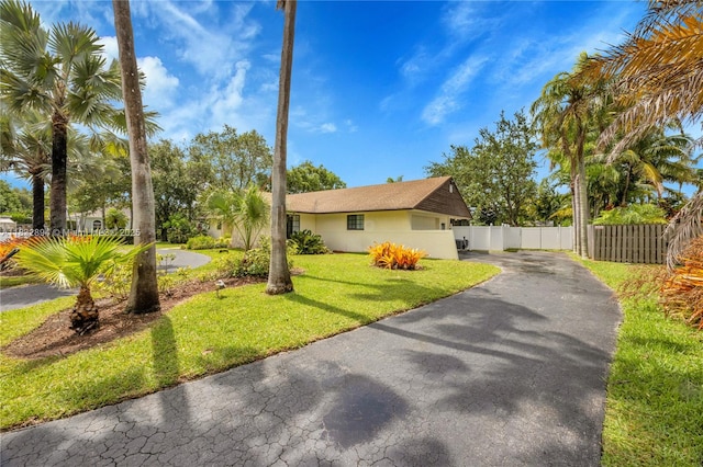 7804 SW 178th Ter, Palmetto Bay, FL 33157 - view of property exterior featuring driveway and stucco siding