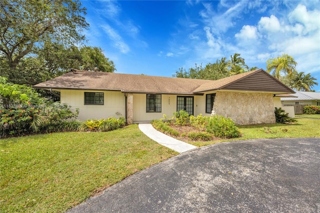 7804 SW 178th Ter, Palmetto Bay, FL 33157 - ranch-style house featuring a front lawn