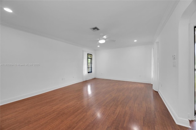 7804 SW 178th Ter, Palmetto Bay, FL 33157 - spare room with ornamental molding, ceiling fan, dark wood-style floors, arched walkways, and recessed lighting