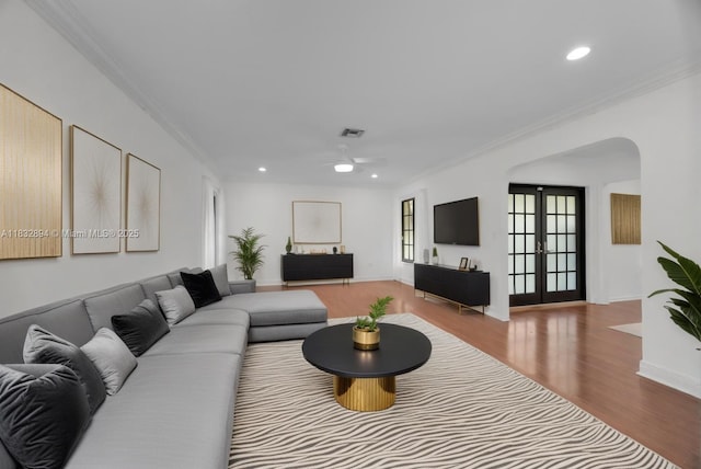 7804 SW 178th Ter, Palmetto Bay, FL 33157 - living area with crown molding, wood finished floors, recessed lighting, ceiling fan, and arched walkways