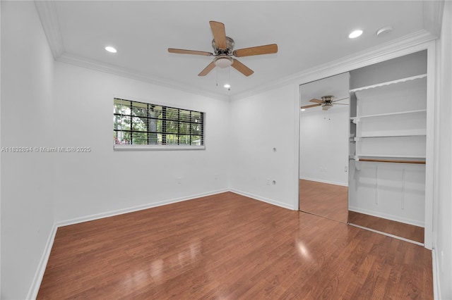 7804 SW 178th Ter, Palmetto Bay, FL 33157 - unfurnished bedroom with wood finished floors, recessed lighting, a ceiling fan, crown molding, and a closet