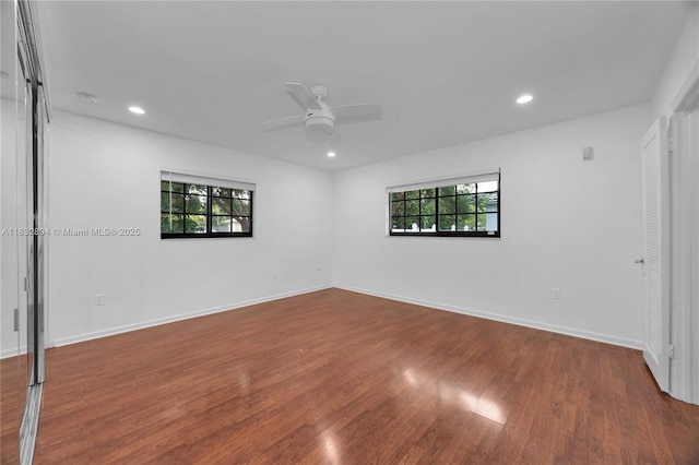 7804 SW 178th Ter, Palmetto Bay, FL 33157 - empty room with healthy amount of natural light, dark wood-style floors, a ceiling fan, and recessed lighting