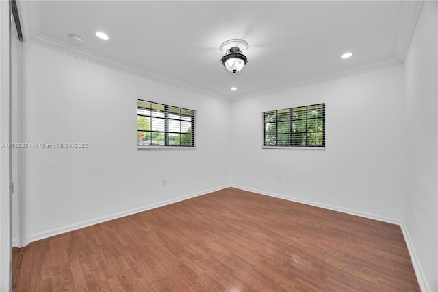 7804 SW 178th Ter, Palmetto Bay, FL 33157 - empty room featuring wood finished floors, crown molding, recessed lighting, and a smoke detector