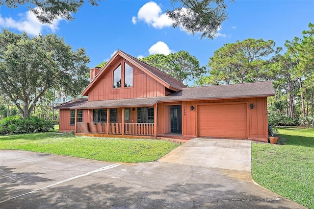 7264 159th Ct N, Palm Beach Gardens, FL 33418 - view of front of home with a porch, an attached garage, a front yard, and a chimney