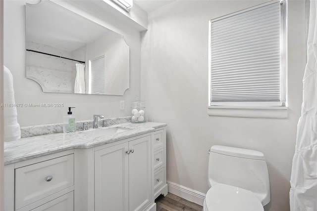 7264 159th Ct N, Palm Beach Gardens, FL 33418 - bathroom featuring vanity, wood finished floors, and a shower with curtain