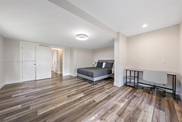 7264 159th Ct N, Palm Beach Gardens, FL 33418 - bedroom with wood finished floors and baseboards